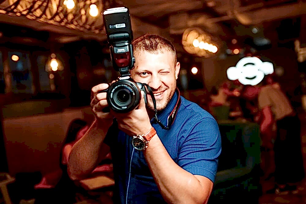 Фотограф